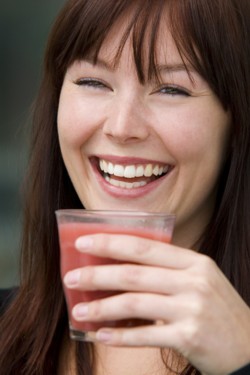 lady drinking beet juice Redibeets