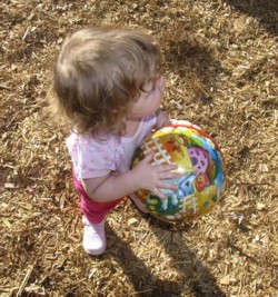 toddler with bal